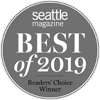 A circular badge that reads "Seattle Magazine Best of 2019 Readers' Choice Winner" in white text on a gray background.